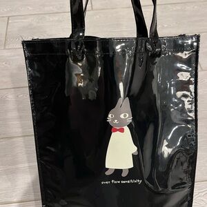 Glossy Black Tote with Playful Rabbit Design